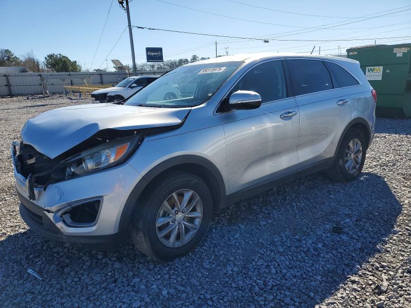 KIA SORENTO LX 2016 with VIN 5XYPG4A37GG039277 - Photo from auction