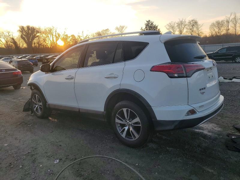 Photo 2 from auction – 2016 TOYOTA RAV4 with VIN JTMWFREV5GJ074195