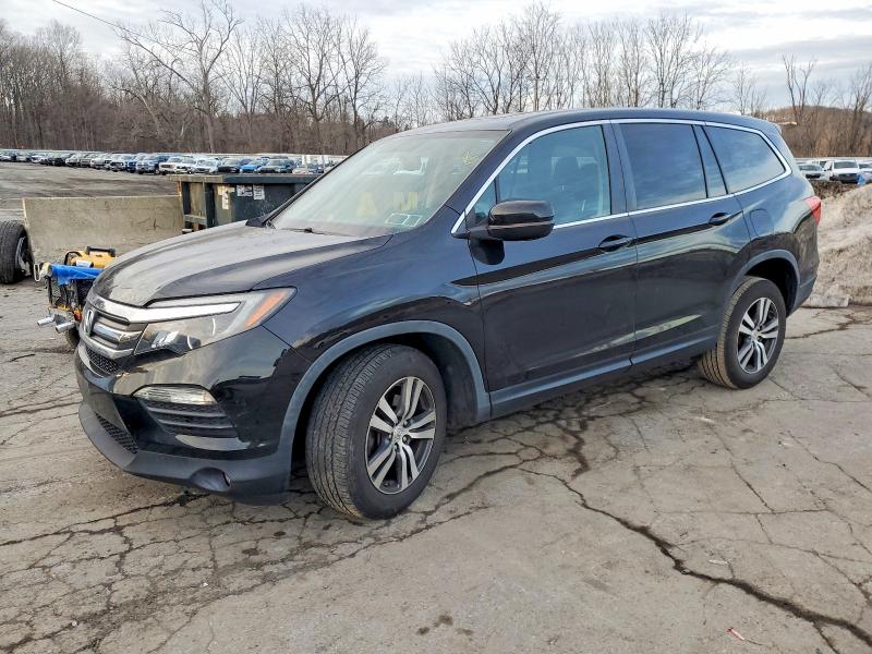 HONDA PILOT EXL 2018 with VIN 5FNYF6H51JB038764 - Photo from auction