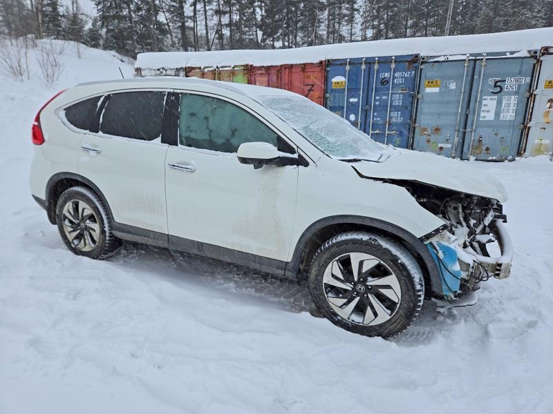 Photo 4 from auction – 2015 HONDA CR-V TOURI with VIN 5J6RM4H95FL801367