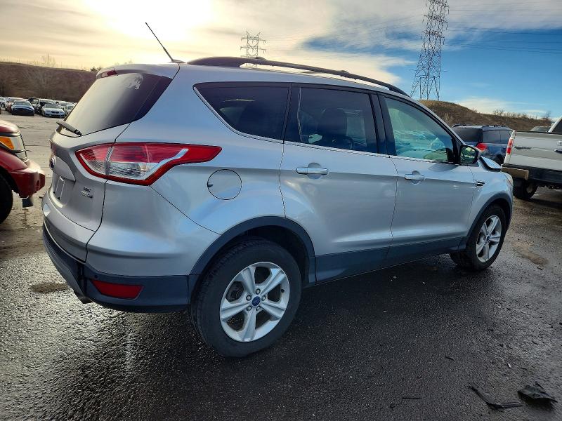 Photo 3 from auction – 2014 FORD ESCAPE with VIN 1FMCU9GX0EUA22116