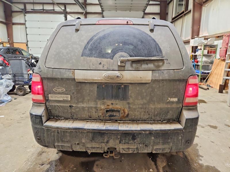 Photo 6 from auction – 2010 FORD ESCAPE LIM with VIN 1FMCU9EG9AKA61098