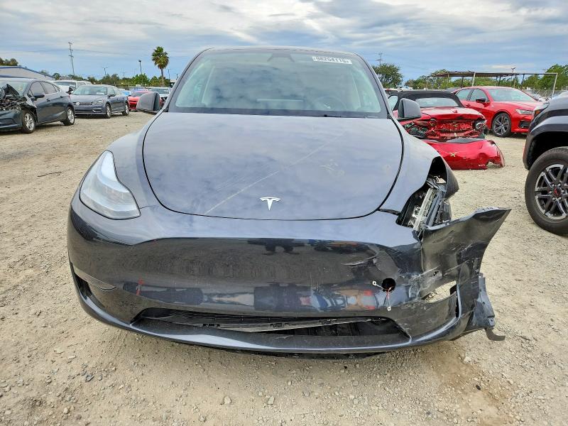 Photo 5 from auction – 2025 TESLA MODEL Y with VIN 7SAYGDED4SF303128