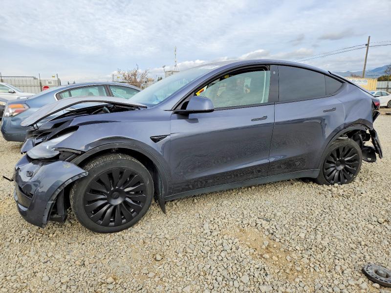 TESLA MODEL Y 2023 with VIN 7SAYGDEE8PF644774 - Photo from auction
