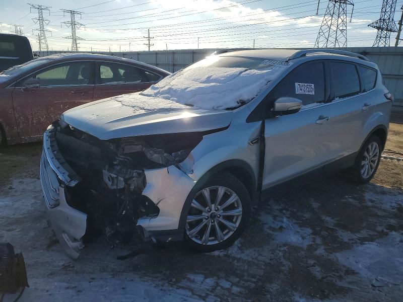 FORD ESCAPE 2017 with VIN 1FMCU9JDXHUC83899 - Photo from auction