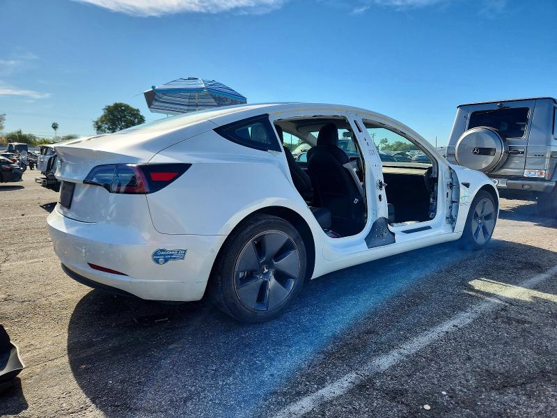 Photo 3 from auction – 2021 TESLA MODEL 3 with VIN 5YJ3E1EA3MF016464