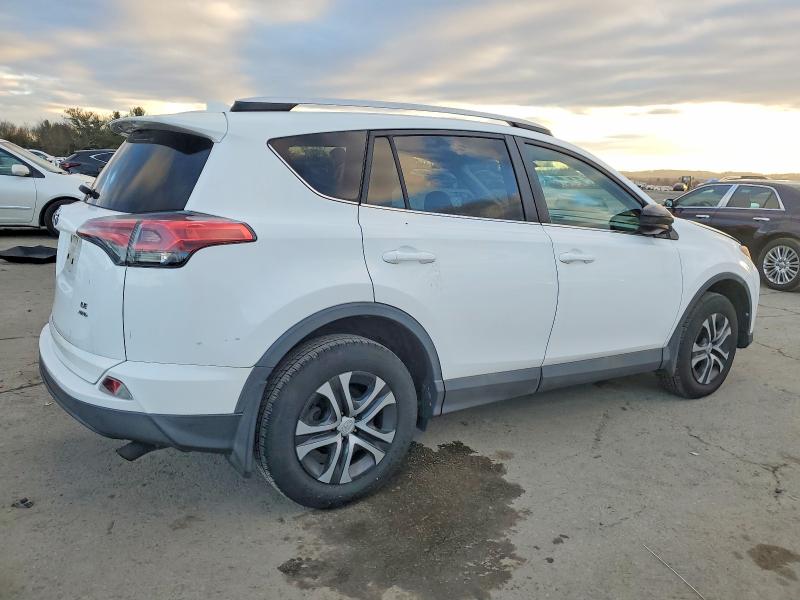 Photo 3 from auction – 2016 TOYOTA RAV4 LE with VIN 2T3BFREV0GW504232