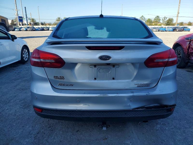 Photo 6 from auction – 2016 FORD FOCUS TITA with VIN 1FADP3J20GL292715
