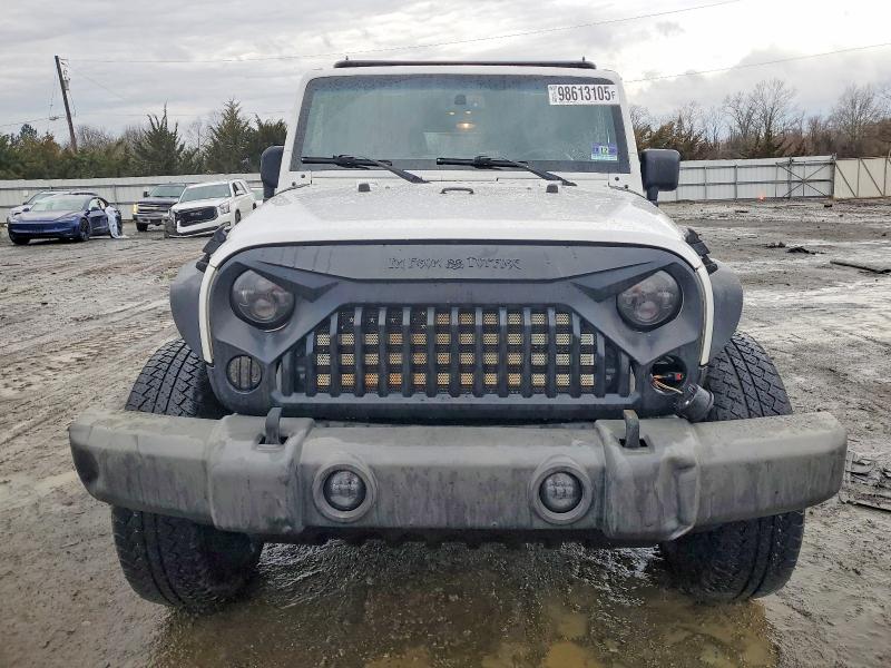 Photo 5 from auction – 2014 JEEP WRANGLER U with VIN 1C4BJWDG4EL177169