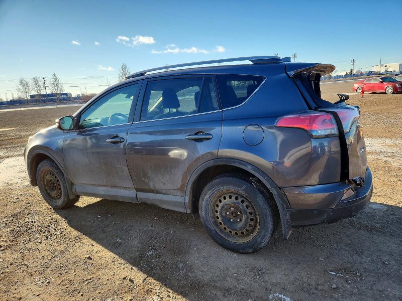 Photo 2 from auction – 2017 TOYOTA RAV4 LE with VIN 2T3BFREV7HW556667