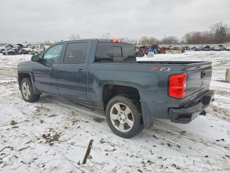 Photo 2 from auction – 2018 CHEVROLET SILVERADO with VIN 3GCUKREC1JG372625
