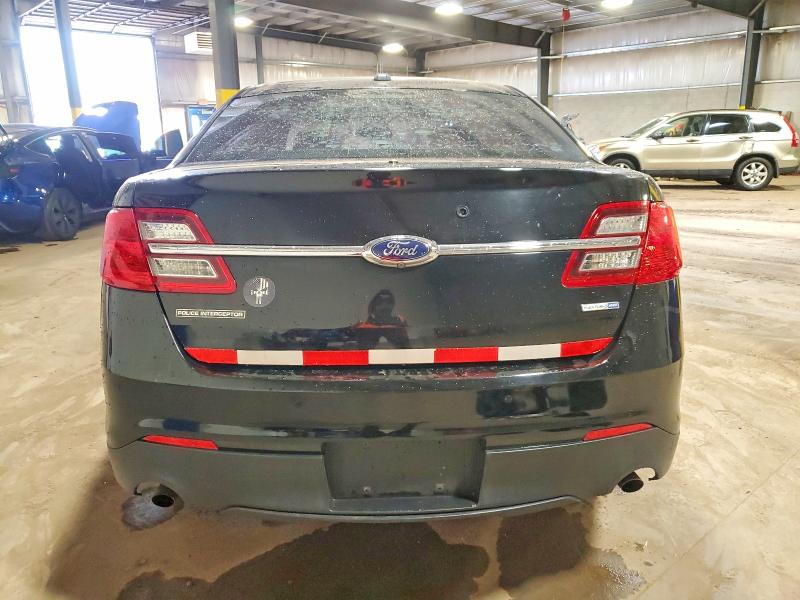 Foto 6 de la subasta – 2014 FORD TAURUS POL con VIN 1FAHP2MK8EG111924