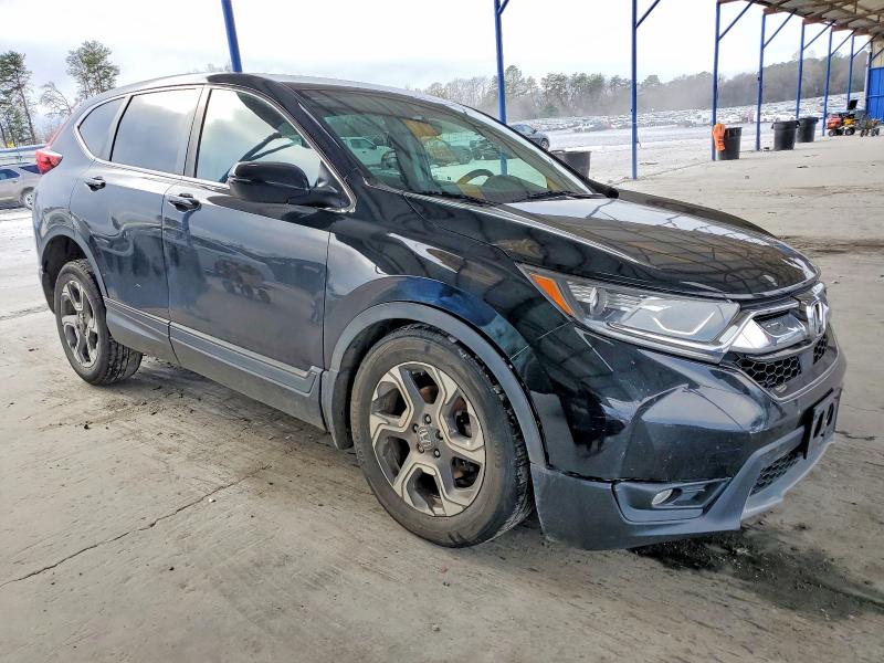 Photo 4 from auction – 2017 HONDA CR-V with VIN 7FARW1H87HE017563