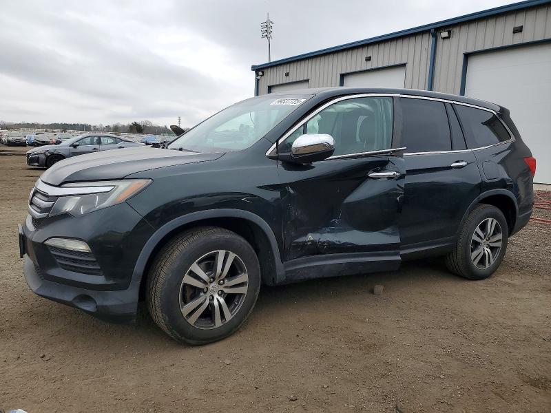 HONDA PILOT 2016 with VIN 5FNYF6H57GB094023 - Photo from auction