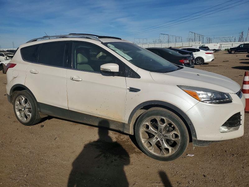 Photo 4 from auction – 2016 FORD ESCAPE with VIN 1FMCU0J92GUA99241