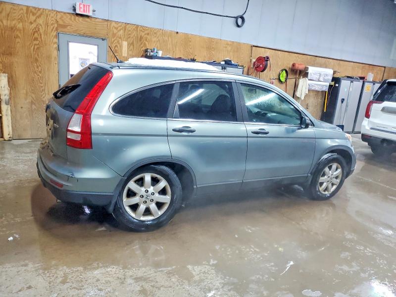 Photo 3 from auction – 2011 HONDA CR-V LX with VIN 5J6RE4H37BL809067