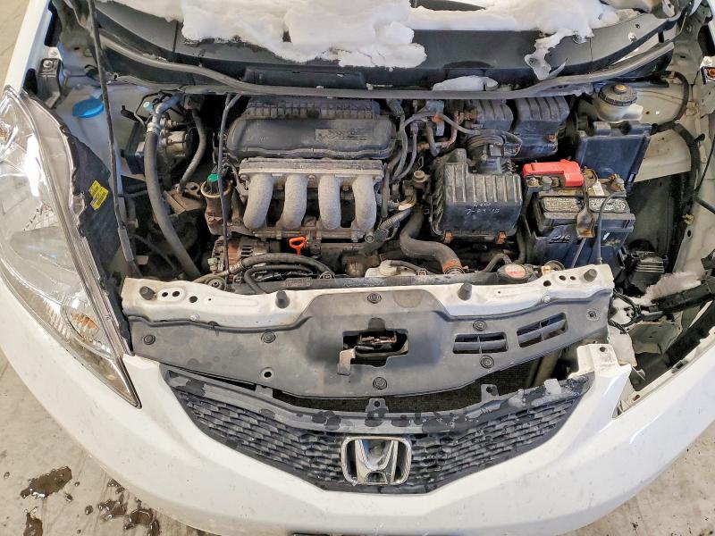 Photo 11 from auction – 2009 HONDA FIT with VIN JHMGE88289S045286