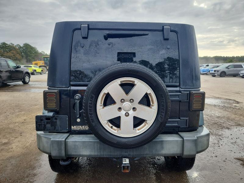 Photo 6 from auction – 2009 JEEP WRANGLER U with VIN 1J4GA39159L752503