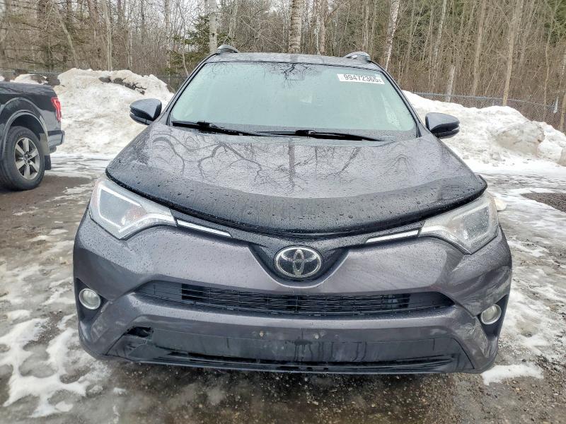 Photo 5 from auction – 2018 TOYOTA RAV4 with VIN 2T3ZFREV9JW426135