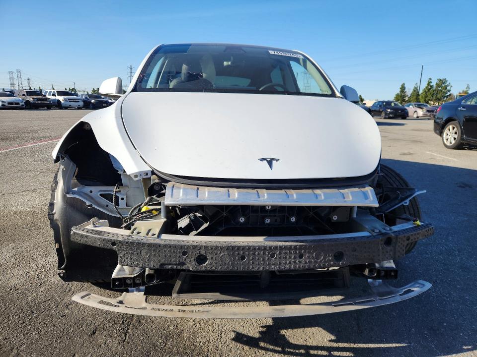Photo 5 from auction – 2022 TESLA MODEL Y with VIN 7SAYGDEE2NF560348