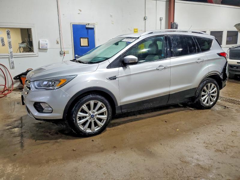 FORD ESCAPE TIT 2017 with VIN 1FMCU9JD3HUB97771 - Photo from auction