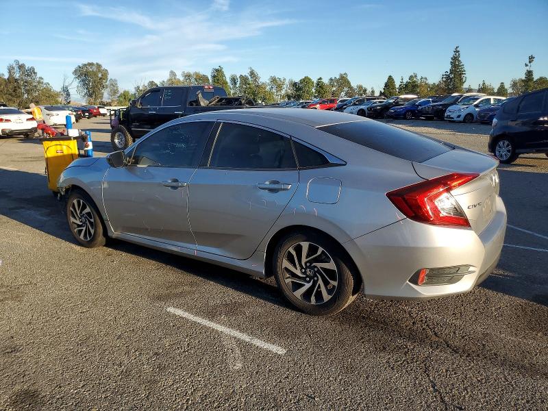 Photo 2 from auction – 2016 HONDA CIVIC LX with VIN 2HGFC2F53GH566502