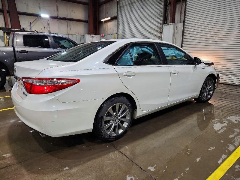 Photo 3 from auction – 2016 TOYOTA CAMRY HYBR with VIN 4T1BD1FK7GU192317