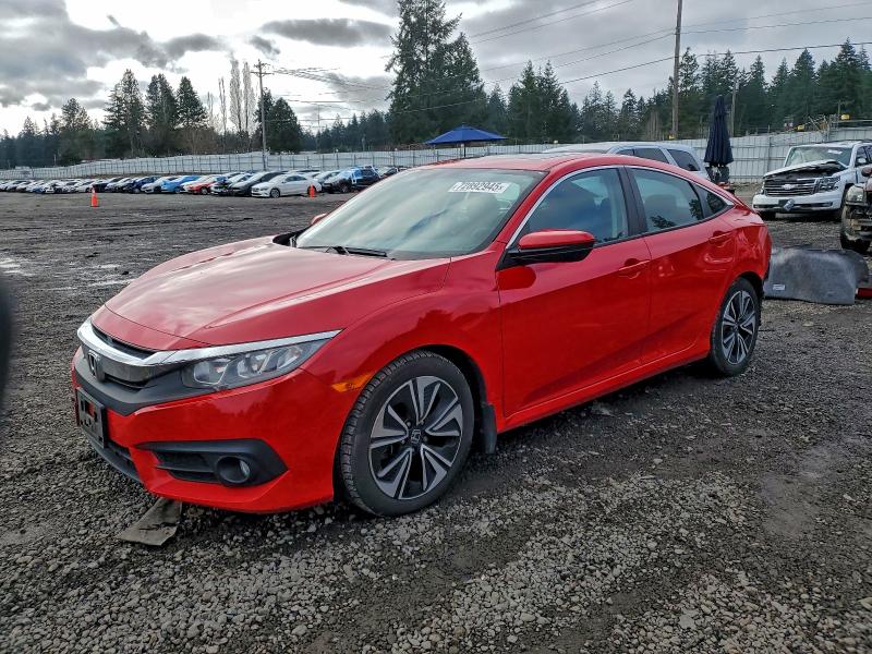 HONDA CIVIC EX 2016 with VIN 2HGFC1F35GH642620 - Photo from auction