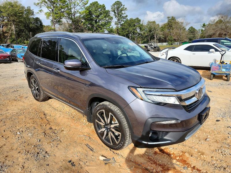 Photo 4 from auction – 2021 HONDA PILOT TOUR with VIN 5FNYF5H62MB035637