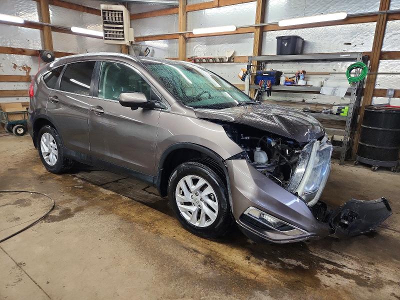 Photo 4 from auction – 2016 HONDA CR-V EXL with VIN 2HKRM4H71GH673798