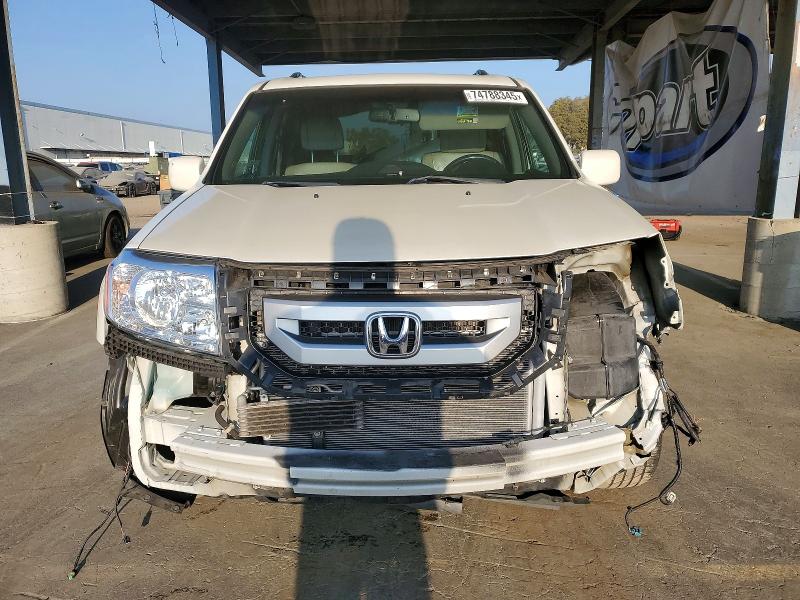 Photo 5 from auction – 2011 HONDA PILOT TOUR with VIN 5FNYF4H97BB083913