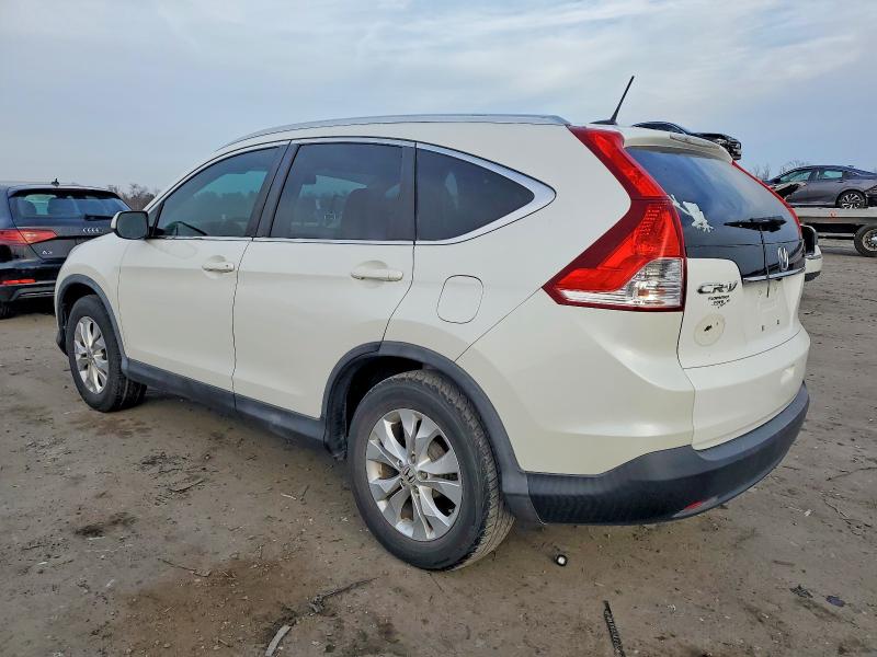 Photo 2 from auction – 2014 HONDA CR-V with VIN 5J6RM3H76EL001359