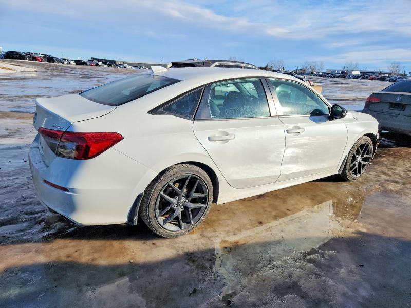 Photo 3 from auction – 2022 HONDA CIVIC SPOR with VIN 2HGFE2F58NH130803