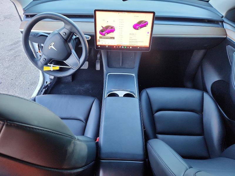 Photo 8 from auction – 2023 TESLA MODEL Y with VIN 7SAYGAEE5PF713130