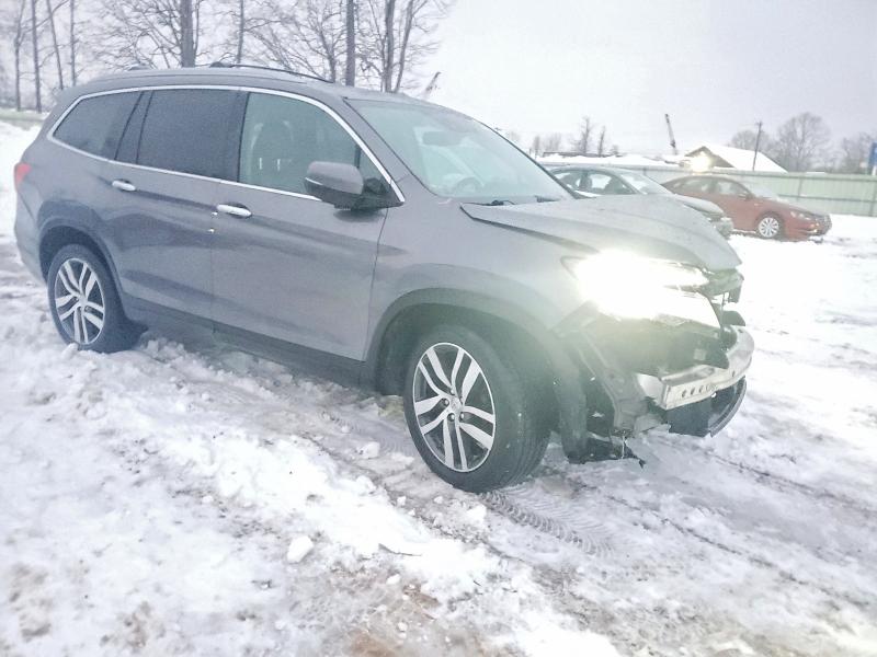 Photo 4 from auction – 2016 HONDA PILOT ELIT with VIN 5FNYF6H02GB117549