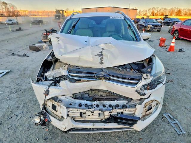 Photo 5 from auction – 2015 FORD ESCAPE TIT with VIN 1FMCU9J99FUC23976