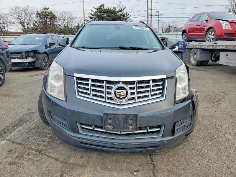Photo 5 from auction – 2015 CADILLAC SRX with VIN 3GYFNAE31FS576079