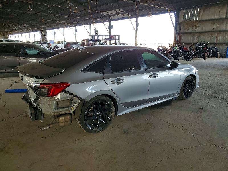 Photo 3 from auction – 2023 HONDA CIVIC SPOR with VIN 2HGFE2F53PH528505