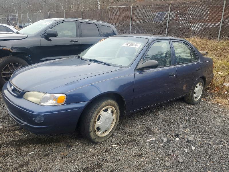 TOYOTA COROLLA 1999 with VIN 2T1BR12E3XC247154 - Photo from auction
