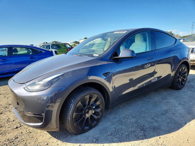 TESLA MODEL Y 2023 with VIN 7SAYGDEE4PF897185 - Photo from auction