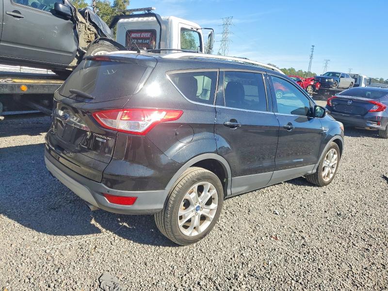 Photo 3 from auction – 2014 FORD ESCAPE TIT with VIN 1FMCU9J95EUC82859