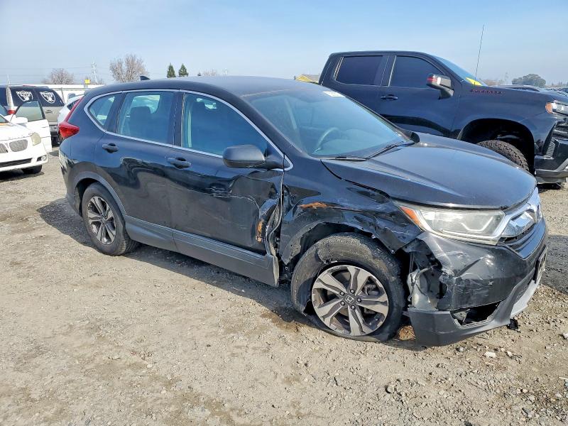 Photo 4 from auction – 2017 HONDA CR-V LX with VIN 7FARW5H36HE002371