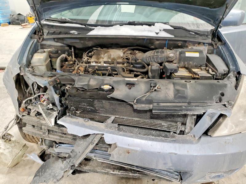 Photo 12 from auction – 2007 KIA SEDONA with VIN KNDMB233476111090