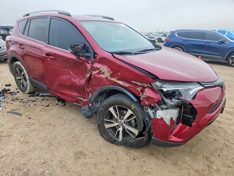 Photo 4 from auction – 2018 TOYOTA RAV4 with VIN 2T3WFREV0JW428648