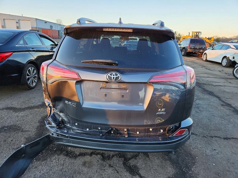 Photo 6 from auction – 2017 TOYOTA RAV4 LE with VIN JTMBFREV2HD201421
