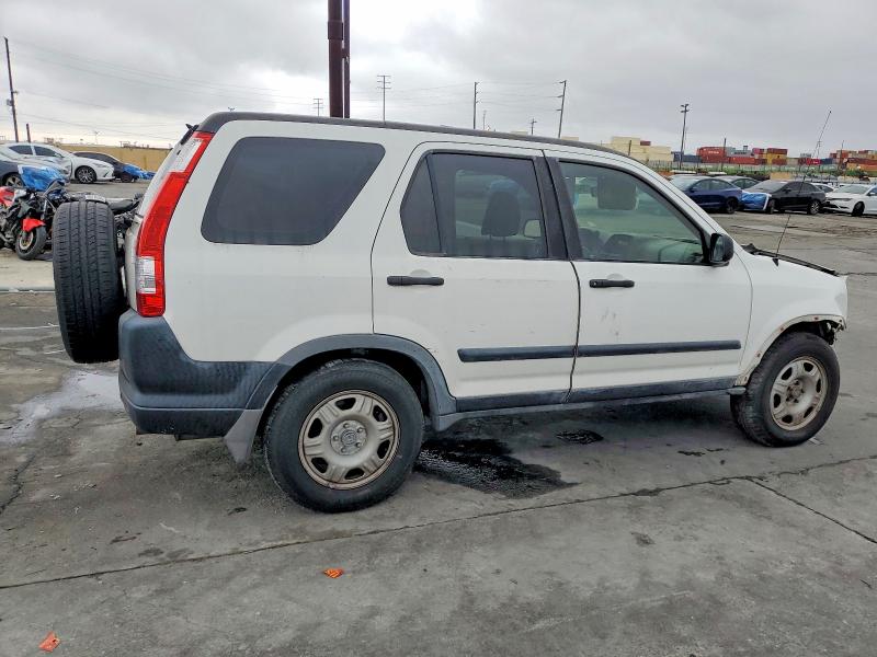 Photo 3 from auction – 2006 HONDA CR-V LX with VIN JHLRD68596C012950
