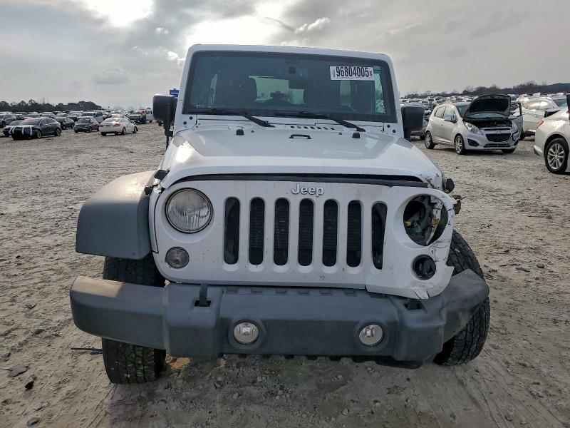 Photo 5 from auction – 2015 JEEP WRANGLER U with VIN 1C4BJWDG9FL502075