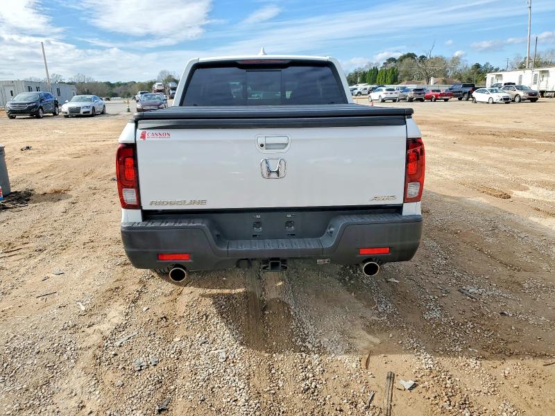Photo 6 from auction – 2023 HONDA RIDGELINE with VIN 5FPYK3F50PB032788