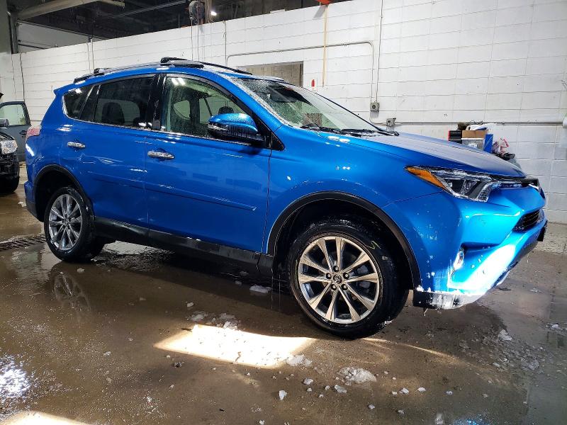Photo 4 from auction – 2017 TOYOTA RAV4 LIMIT with VIN JTMDFREV1HJ138757