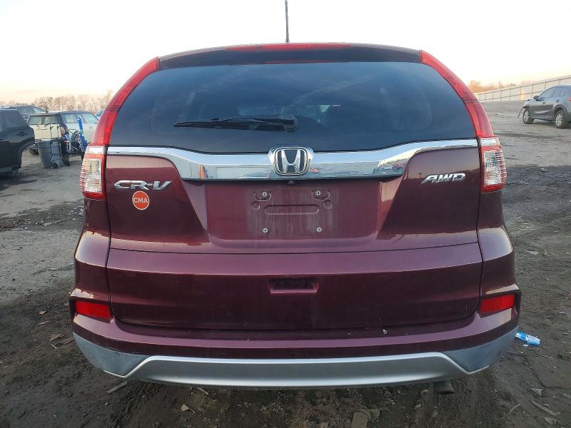 Photo 6 from auction – 2015 HONDA CR-V with VIN 2HKRM4H50FH634505